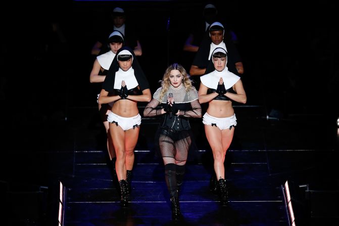 Madonna leading her backup dancers dressed as nuns for the "Rebel Heart" tour in 2016.