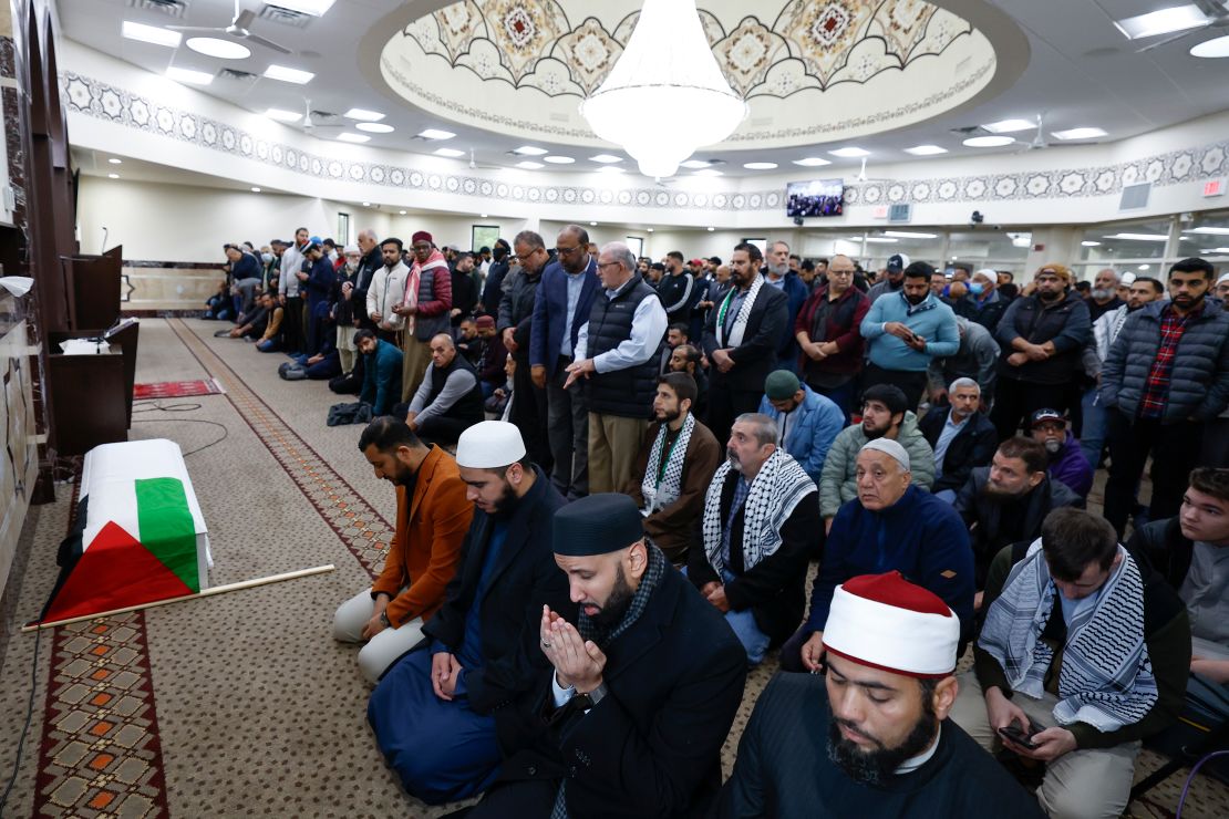 Community members pray during a funeral service for Wadea Al-Fayoume at the Mosque Foundation on October 16, 2023 in Bridgeview, Illinois. 