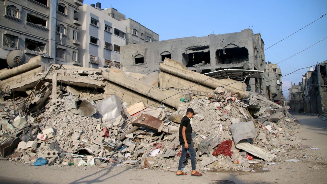 Palestinian citizens inspect damage to their homes caused by Israeli airstrikes on October 14 in Gaza City.