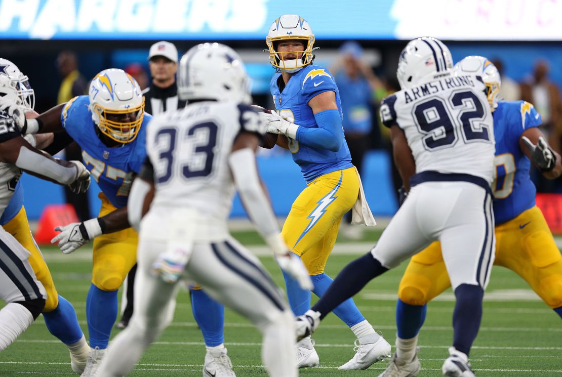 INGLEWOOD, CALIFORNIA - OCTOBER 16: Justin Herbert #10 of the Los Angeles Chargers looks to pass in the first half against the Dallas Cowboys at SoFi Stadium on October 16, 2023 in Inglewood, California. (Photo by Harry How/Getty Images)