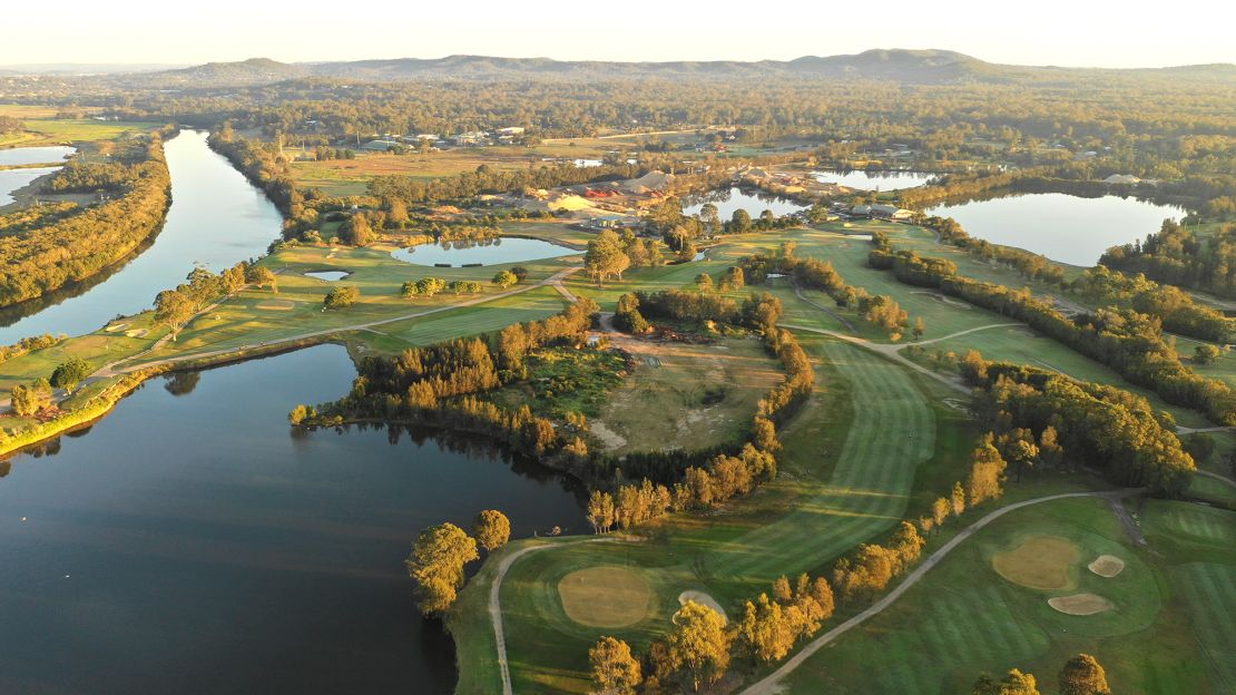 An aerial view of Carbrook golf club, which sits along the edge of the Logan River (left).