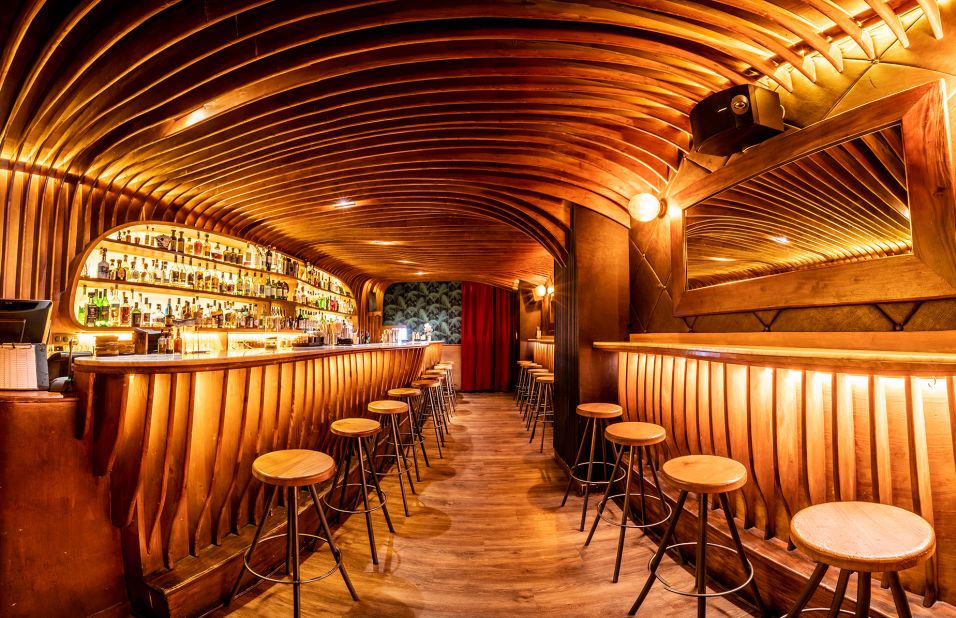 <strong>4. Paradiso, Barcelona:</strong> The bragging rights continue for this Mediterranean city with Paradiso, which patrons enter through a pastrami shop fridge. Inside, they'll find a beautifully sculpted Dali-esque curved wooden bar. Paradiso was No. 1 in 2022.