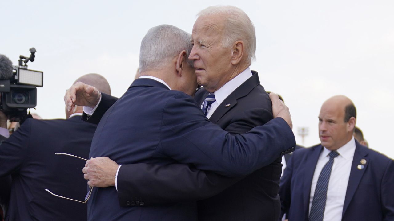 President Joe Biden is greeted by Israeli Prime Minister Benjamin Netanyahu after arriving at Ben Gurion International Airport, Wednesday, Oct. 18, 2023, in Tel Aviv. (AP Photo/Evan Vucci)