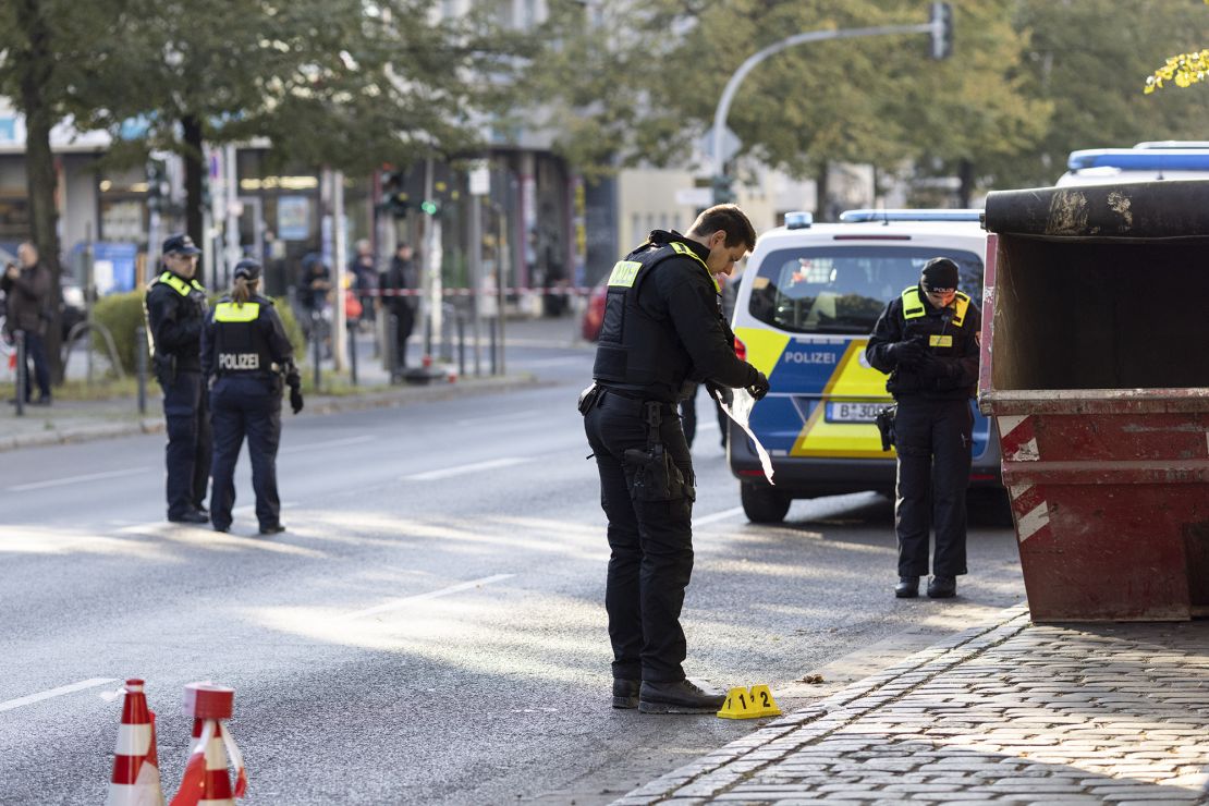 BERLIN, GERMANY - OCTOBER 18: Police stand outside a building that houses a synagogue and school of the Kahal Adass Jisroel Jewish community following a pre-dawn attack on October 18, 2023 in Berlin, Germany. According to police unidentified assailants threw Molotov cocktails towards the building at around 3:00 this morning. No damage or injuries resulted, as the fuel-filled bottles landed on the sidewalk in front of the building. Tensions are on the rise in Berlin, given the city's large Muslim communities that include many Palestinians and Arabs, due to the ongoing conflict between Hamas and Israel and especially since yesterday's bombing of a hospital in Gaza. (Photo by Maja Hitij/Getty Images)