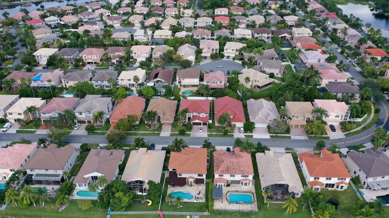 MIRAMAR, FLORIDA - OCTOBER 27:  In this aerial view, single family homes are shown in a residential neighborhood on October 27, 2022 in Miramar, Florida. The rate on the average 30-year fixed mortgage hit 7.08%, up from 6.94% the week prior, according to Freddie Mac. Mortgage rates surpassed 7% for the first time since April 2002. (Photo by Joe Raedle/Getty Images)