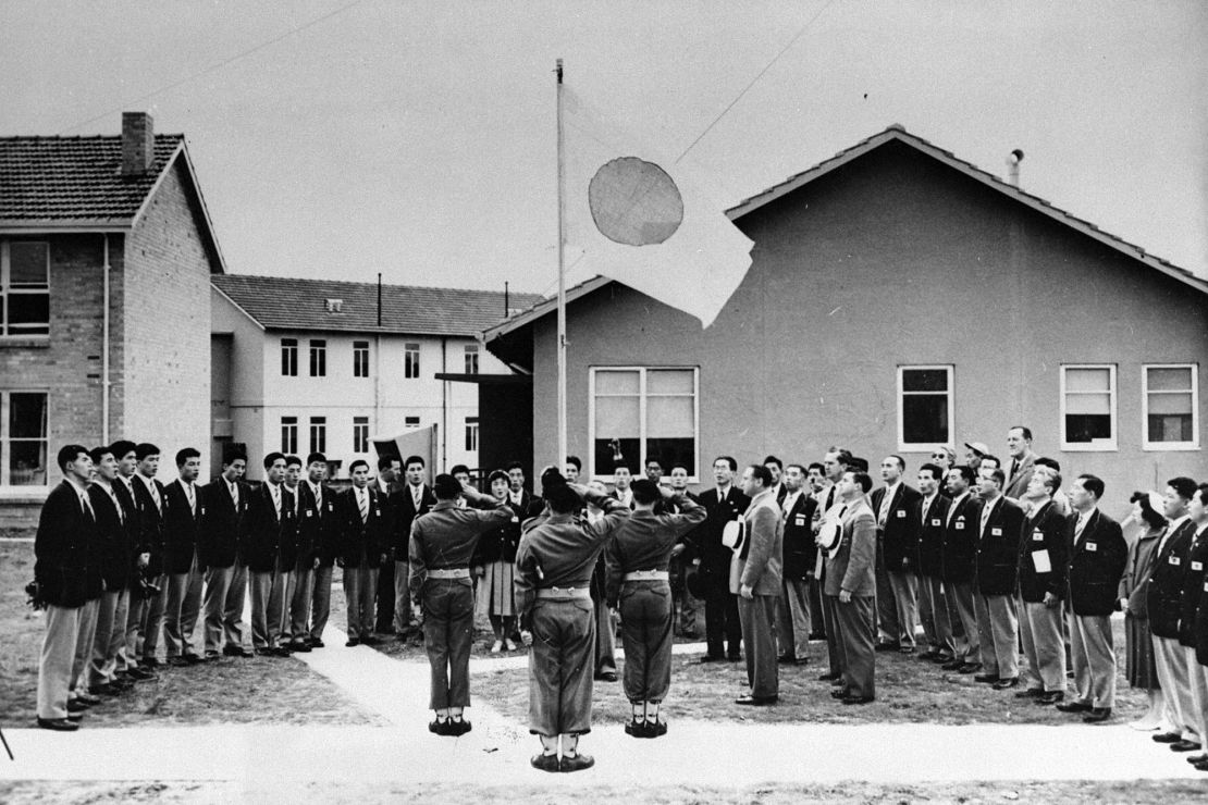 MELBOURNE, AUSTRALIA - NOVEMBER 06: Japan delegation attend the athlete village entering ceremony ahead of the Melbourne Summer Olympic Games on November 6, 1956 in Melbourne, Australia. (Photo by The Asahi Shimbun via Getty Images)
