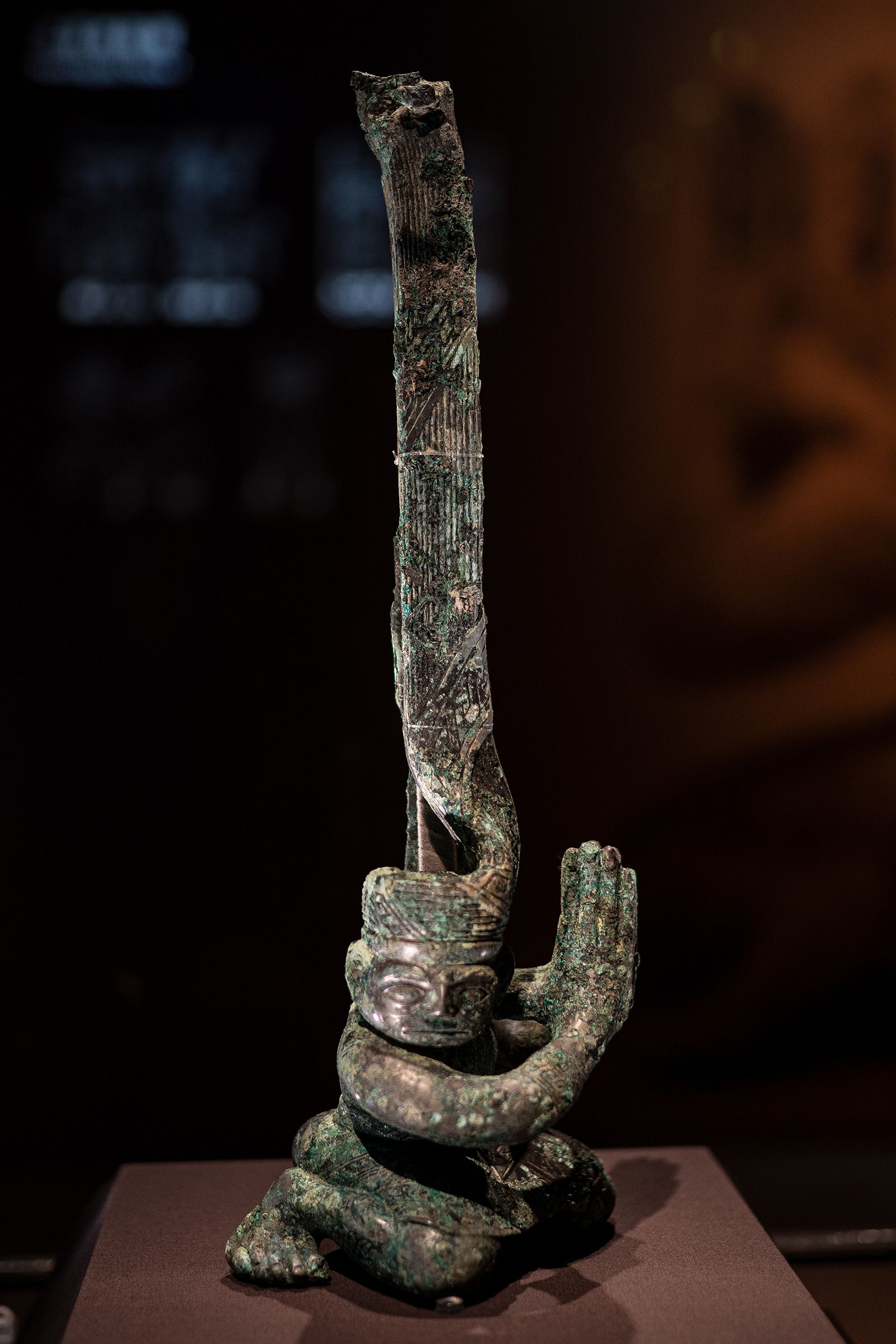 'Kneeling figure with a twisted head', bronze, at the Hong Kong Palace Museum in Hong Kong, China on September 26, 2023.