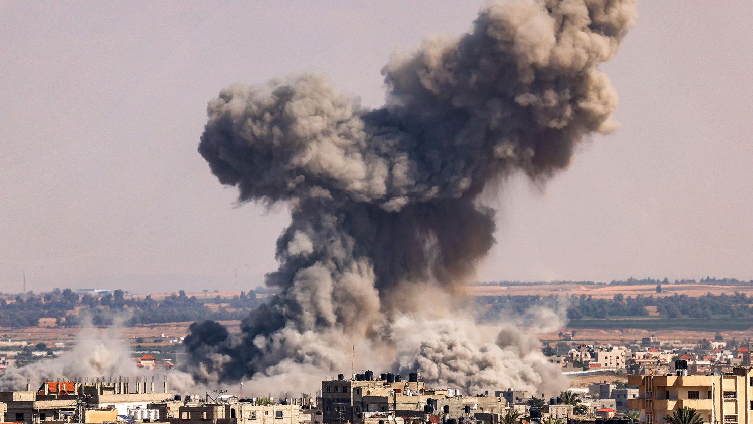 A smoke plume erupts during Israeli bombardment in Rafah in southern Gaza on October 19.