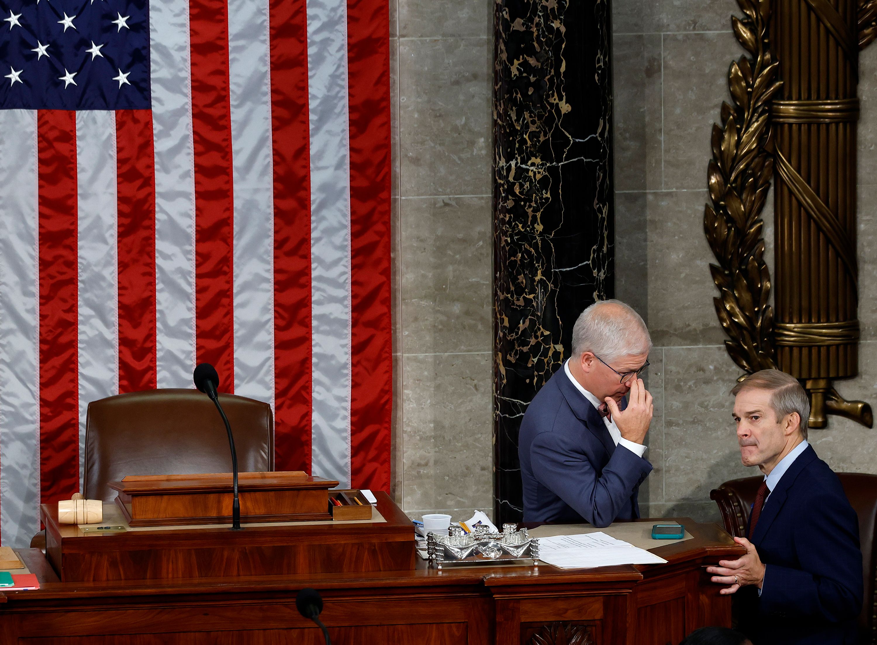 Speaker Pro Tempore Rep. Patrick McHenry speaks to Republican Rep. Jim Jordan as the House of Representatives prepares to vote on a new Speaker of the House in Washington, DC.