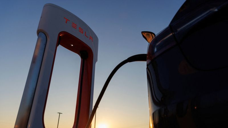 NextImg:Toyota's electric cars will adopt Tesla's charging standard | CNN Business