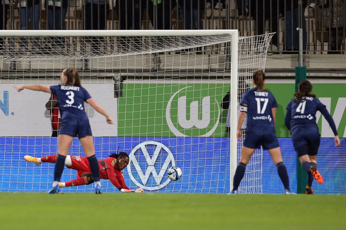 WOLFSBURG, GERMANY - OCTOBER 18: 16 Chiamaka Nnadozie of Paris FC saves a penalty during the UEFA Women's Champions League Qualifying Round 2 Second Leg match between VfL Wolfsburg and Paris FC at  on October 18, 2023 in Wolfsburg, Germany. (Photo by Cathrin Mueller/Getty Images)