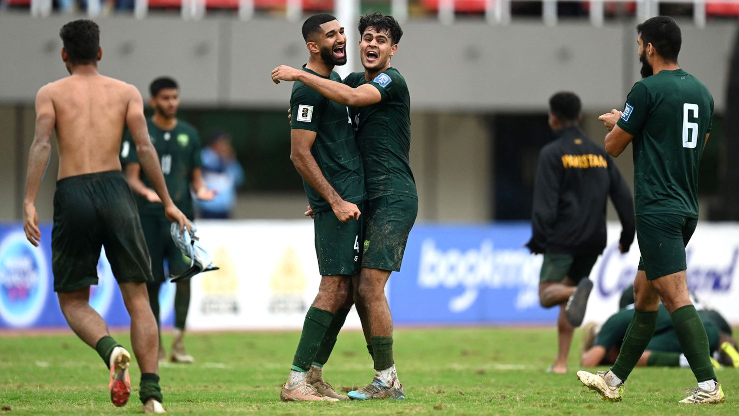 Pakistan's players celebrate their win at the 2026 FIFA World Cup qualifiers football match between Pakistan and Cambodia, at the Jinnah Sports stadium in Islamabad on October 17, 2023. (Photo by Aamir QURESHI / AFP) (Photo by AAMIR QURESHI/AFP via Getty Images)