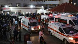 Ambulances carrying victims of Israeli strikes crowd the entrance to the emergency ward of the Al-Shifa hospital in Gaza City on October 15, 2023.