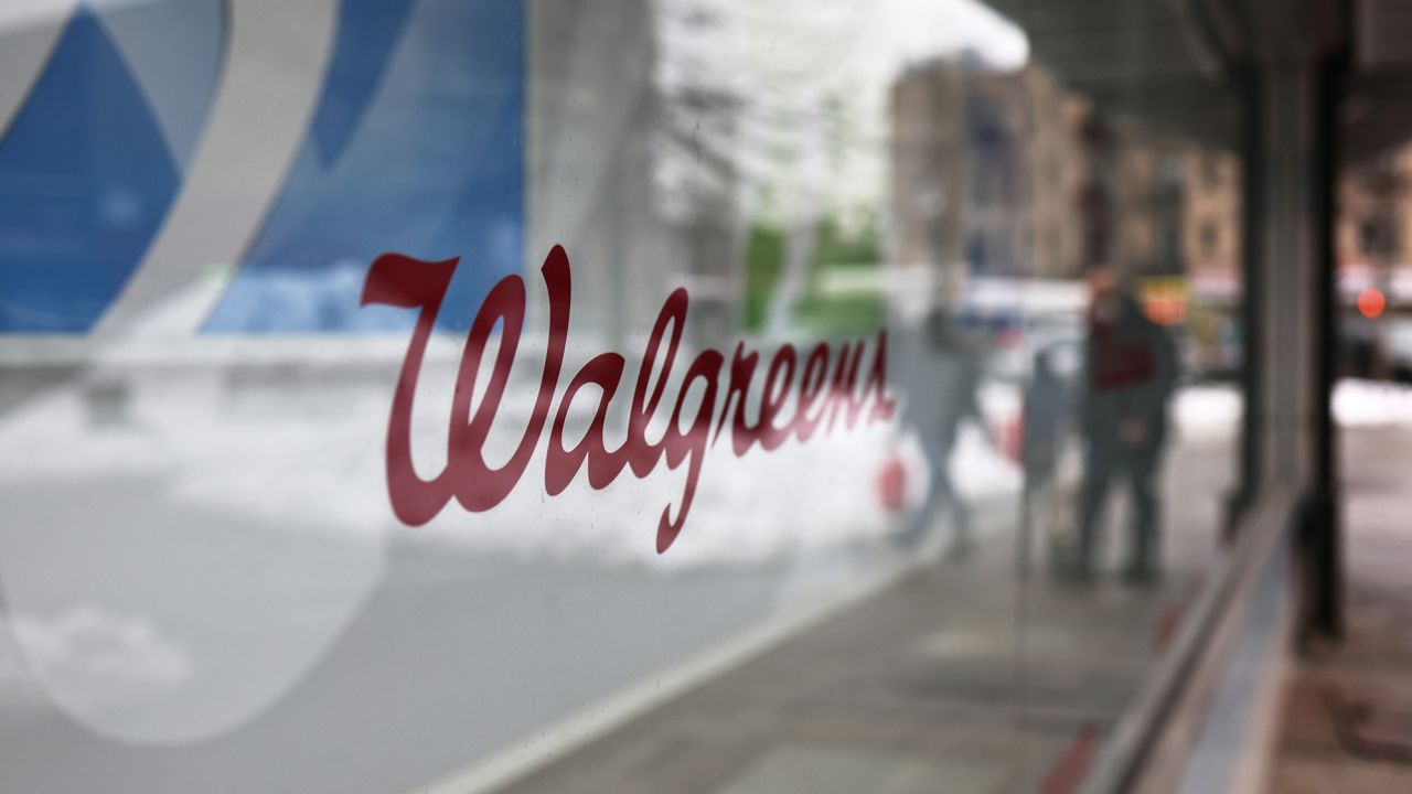 A Walgreens signage is seen on a storefront window in Brooklyn, New York, on February 09, 2021.