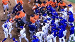 ARLINGTON, TEXAS - OCTOBER 20: Adolis Garcia #53 of the Texas Rangers argues with Martin Maldonado #15 of the Houston Astros after being hit by a pitch by Bryan Abreu #52 of the Houston Astros causing benches to clear during the eighth inning in Game Five of the American League Championship Series at Globe Life Field on October 20, 2023 in Arlington, Texas. (Photo by Carmen Mandato/Getty Images)