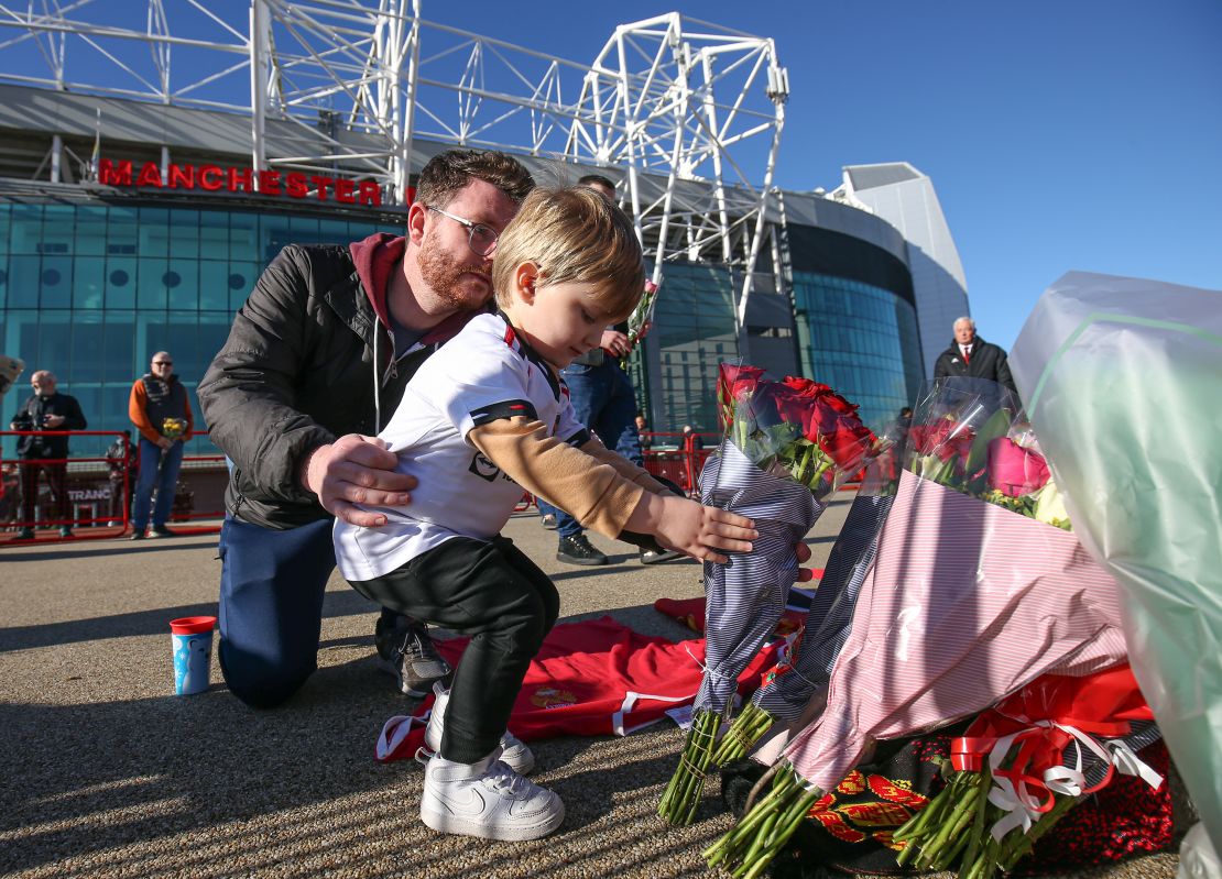 Tributes are laid in memory of Sir Bobby Charlton by The United Trinity statue at Old Trafford, Manchester. Sir Bobby Charlton has died aged 86, his family announced yesterday. Picture date: Sunday October 22, 2023.