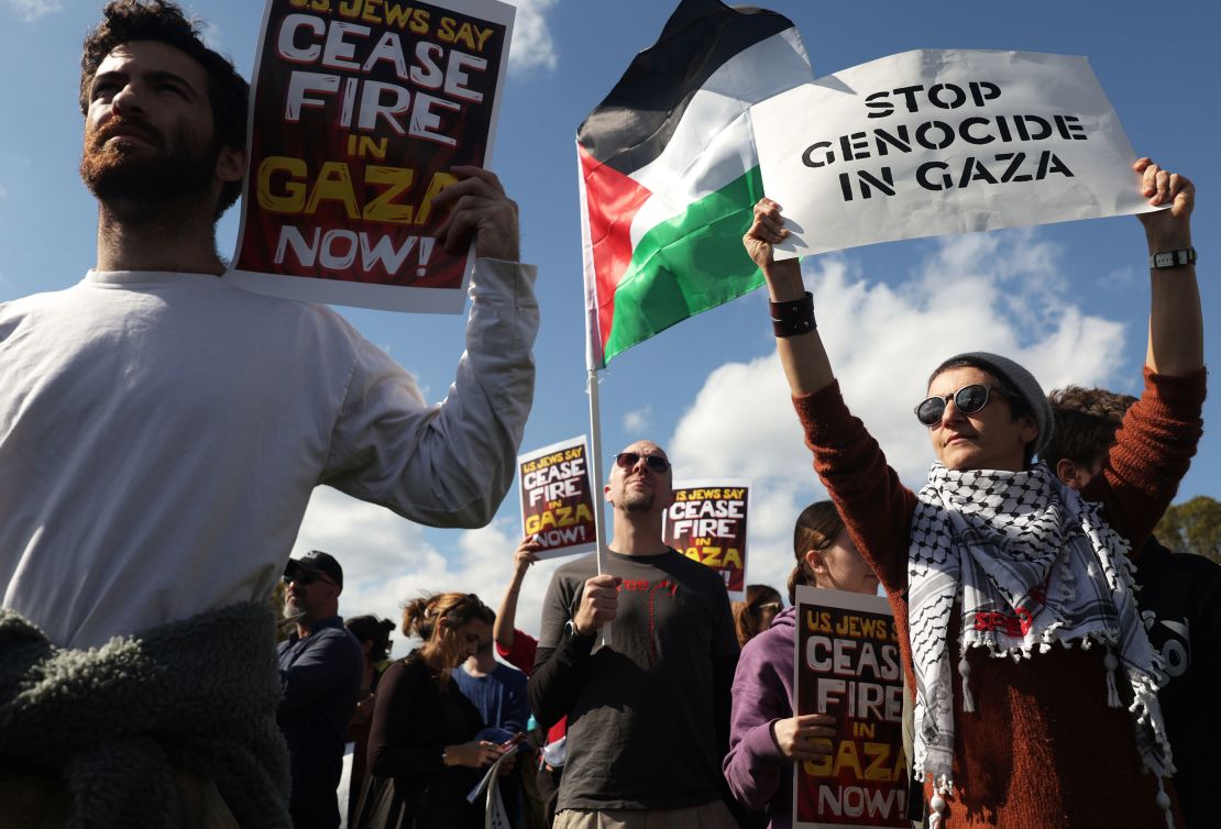 Jewish peace activists carried the Palestinian flag and wore keffiyehs as they marched on Capitol Hill.