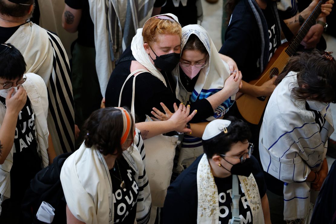 Jewish peace activists embrace during a rally on Capitol Hill for a ceasefire in the Israel-Gaza war.