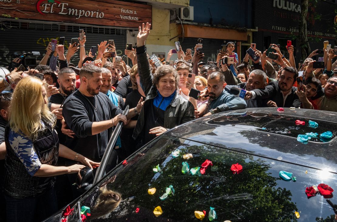 Millay greets supporters before voting during the general election in Buenos Aires, Argentina, Sunday, Oct. 22, 2023.