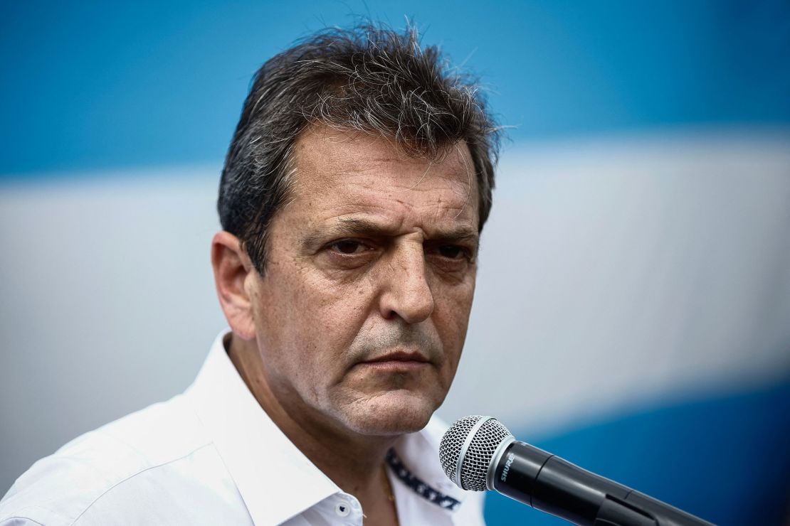 Massa speaks to the press after voting at a polling station in Tigre, Buenos Aires, during the October 22, 2023 presidential election.