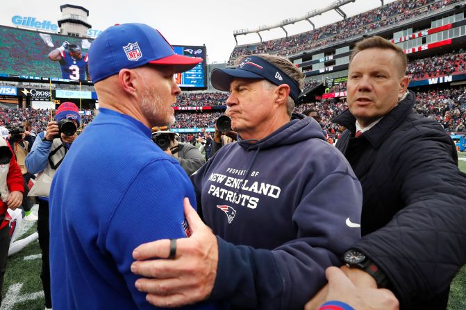 New England Patriots head coach Bill Belichick, right, embraces Buffalo Bills head coach Sean McDermott after the Patriots beat the Bills 29-25 on Sunday, October 22. It was Belichick's 300th regular-season victory.