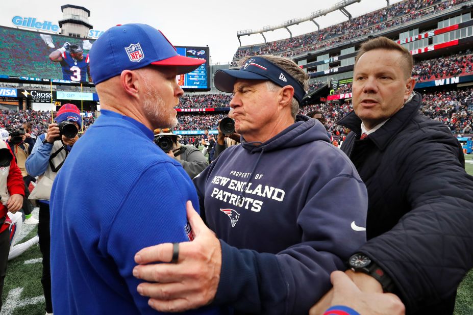 New England Patriots head coach Bill Belichick, right, embraces Buffalo Bills head coach Sean McDermott after the Patriots beat the Bills 29-25 on October 22. It was Belichick's 300th regular-season victory.