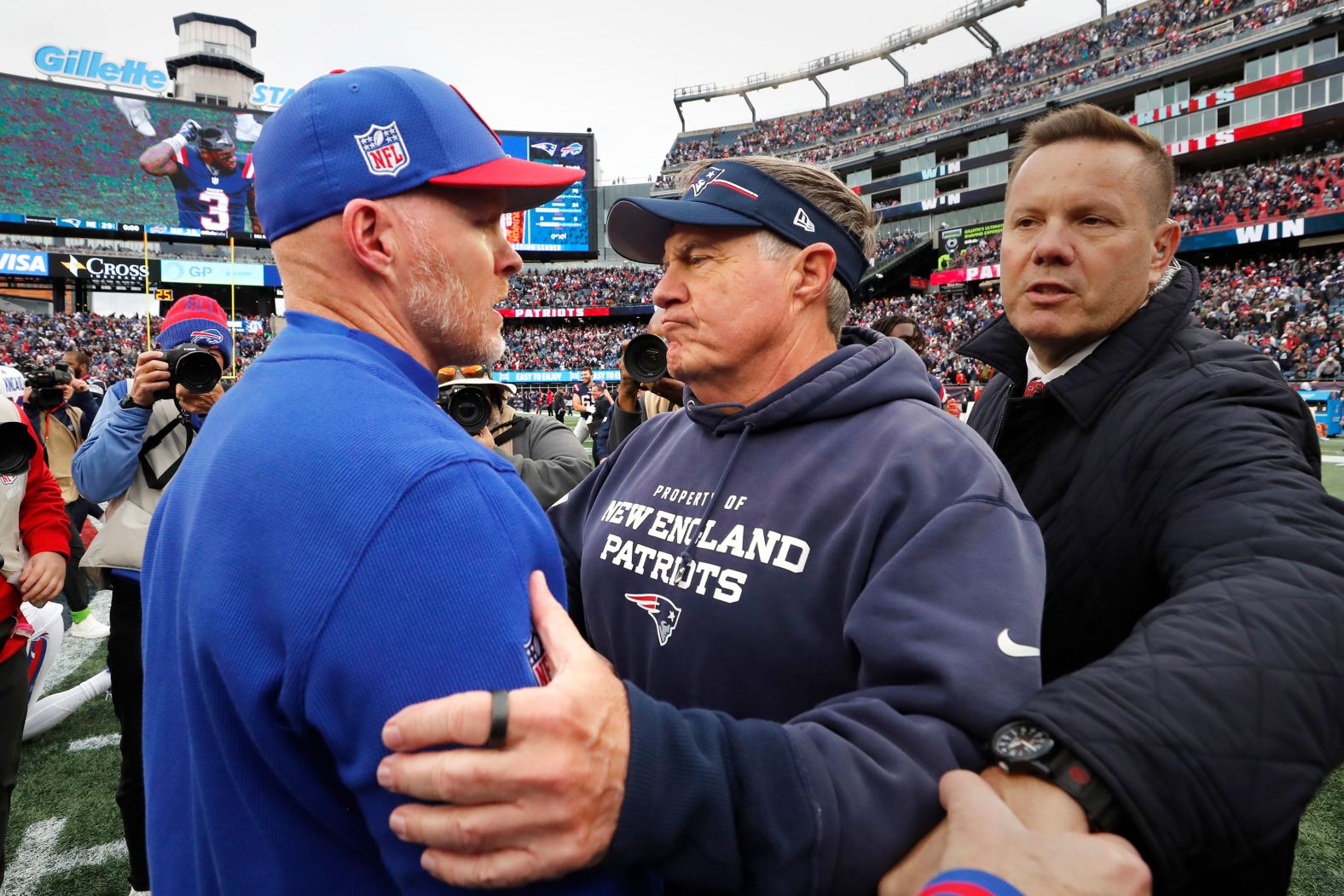 New England Patriots head coach Bill Belichick, right, embraces Buffalo Bills head coach Sean McDermott after the Patriots beat the Bills 29-25 on Sunday, October 22. It was Belichick's 300th regular-season victory.