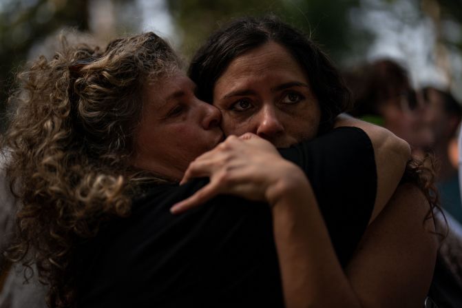 Relatives mourn for a man killed by Hamas during his funeral in Nir Oz, Israel, on October 22.