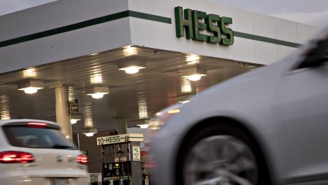 Vehicles drive past a Hess Corp. gas station in Washington, D.C., U.S., on Tuesday, Jan. 24, 2017. Hess is expected to release earnings figures on January 25. Photographer: Andrew Harrer/Bloomberg via Getty Images