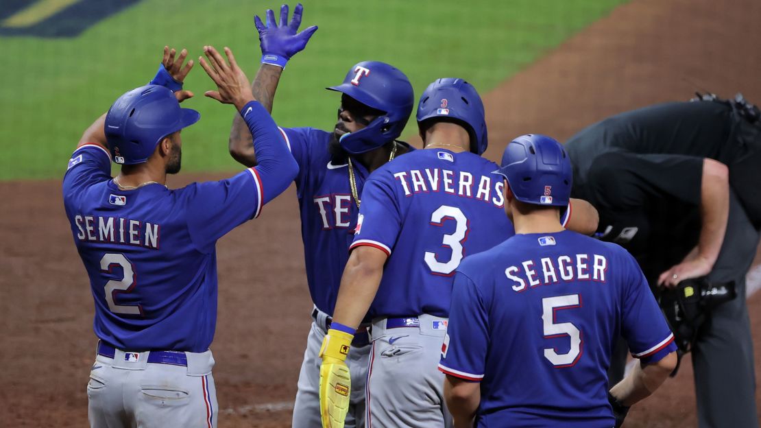 Oct 22, 2023; Houston, Texas, USA;Texas Rangers right fielder Adolis Garcia (53) reacts after hitting a grand slam against the Houston Astros in the ninth inning during game six of the ALCS for the 2023 MLB playoffs at Minute Maid Park. Mandatory Credit: Erik Williams/USA Today Sports