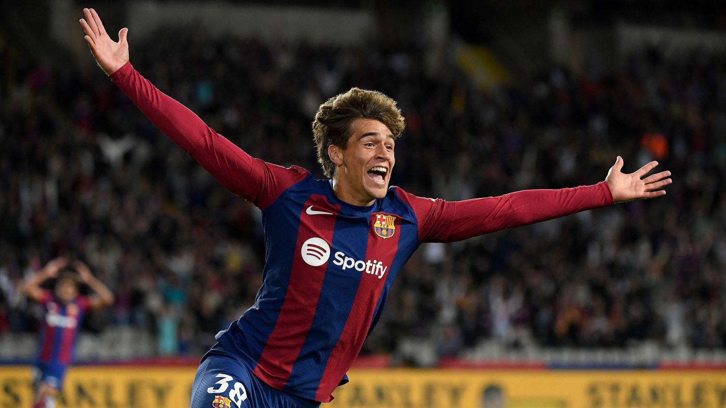 Barcelona's Spanish forward #38 Marc Guiu celebrates after scoring his team's first goal during the Spanish league football match between FC Barcelona and Athletic Club Bilbao at the Estadi Olimpic Lluis Companys in Barcelona on October 22, 2023. (Photo by Josep LAGO / AFP) (Photo by JOSEP LAGO/AFP via Getty Images)
