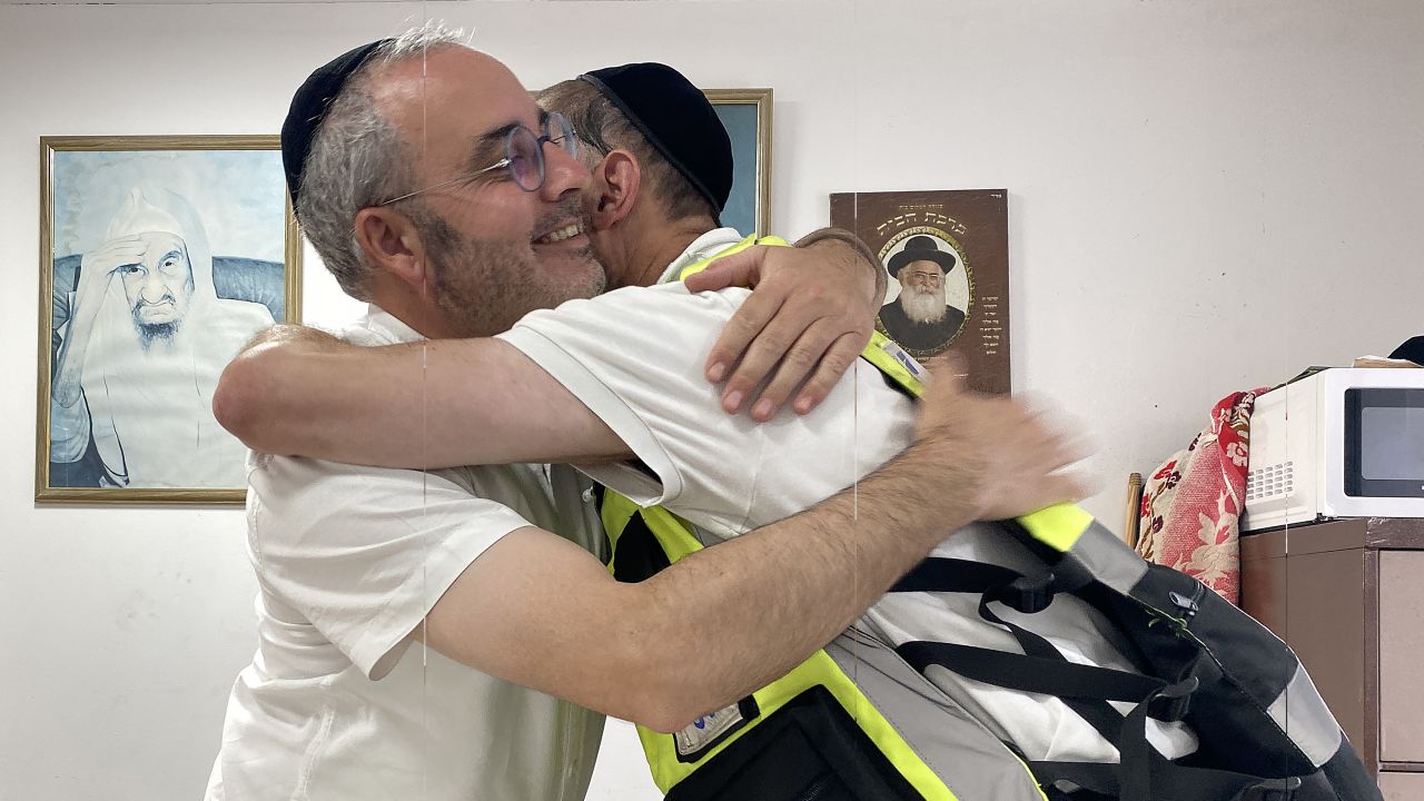 Yossi Landau greets Snir Elmalih at his office in Ashkelon, Israel, on Friday, October 20, 2023.
