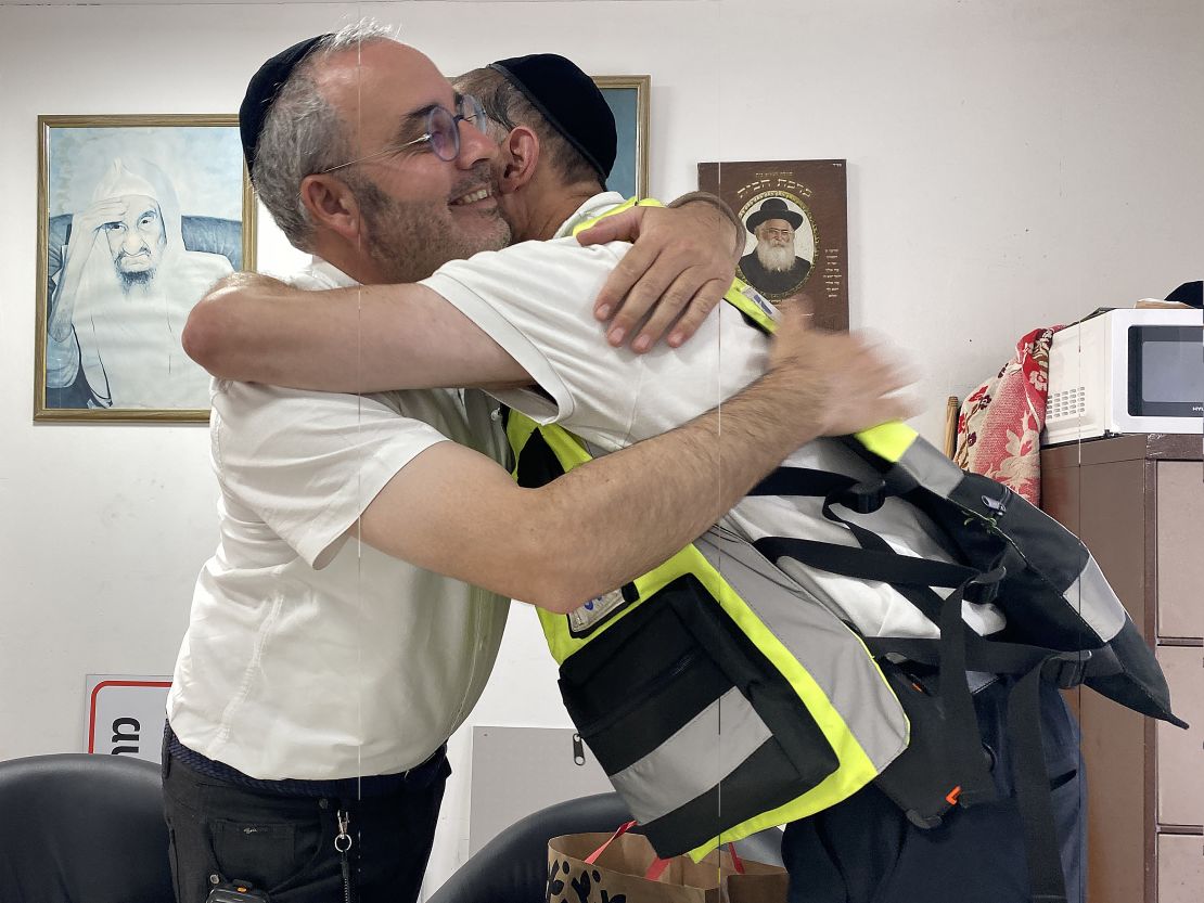 Yossi Landau greets Snir Elmalih at his office in Ashkelon, Israel, on Friday, October 20, 2023.