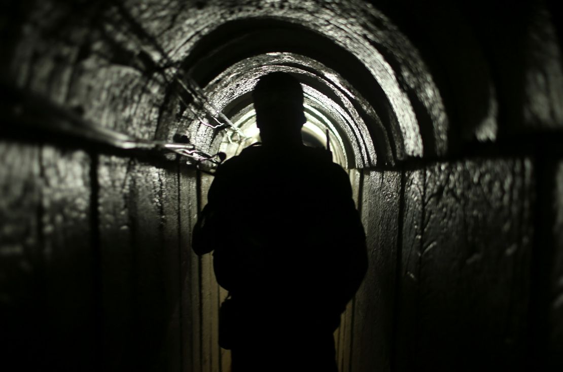 In this 2014 file photo, a fighter from the armed wing of the Hamas movement is seen inside an underground tunnel in Gaza.