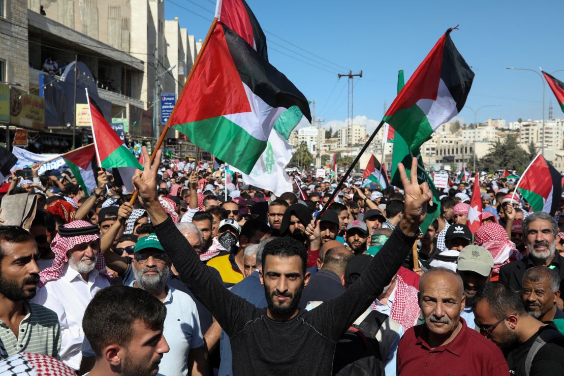 Jordanians gather during a pro-Palestine protest in Amman, on October 20, to express solidarity with civilians in Gaza. 