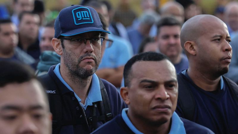 NextImg:GM workers in Brazil go on strike in protest against layoffs | CNN Business