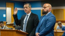 Attorney Scott Grubman stands with his client, Kenneth Chesebro, as Chesebro is sworn in during a plea deal hearing in front of Fulton County Superior Judge Scott McAfee at the Fulton County Courthouse October 20, 2023 in Atlanta, Georgia.