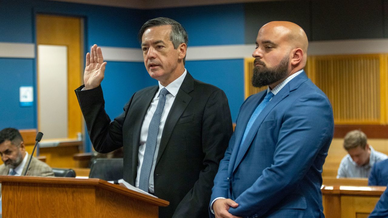 Attorney Scott Grubman stands with his client, Kenneth Chesebro, as Chesebro is sworn in during a plea deal hearing in front of Fulton County Superior Judge Scott McAfee at the Fulton County Courthouse October 20, 2023 in Atlanta, Georgia.