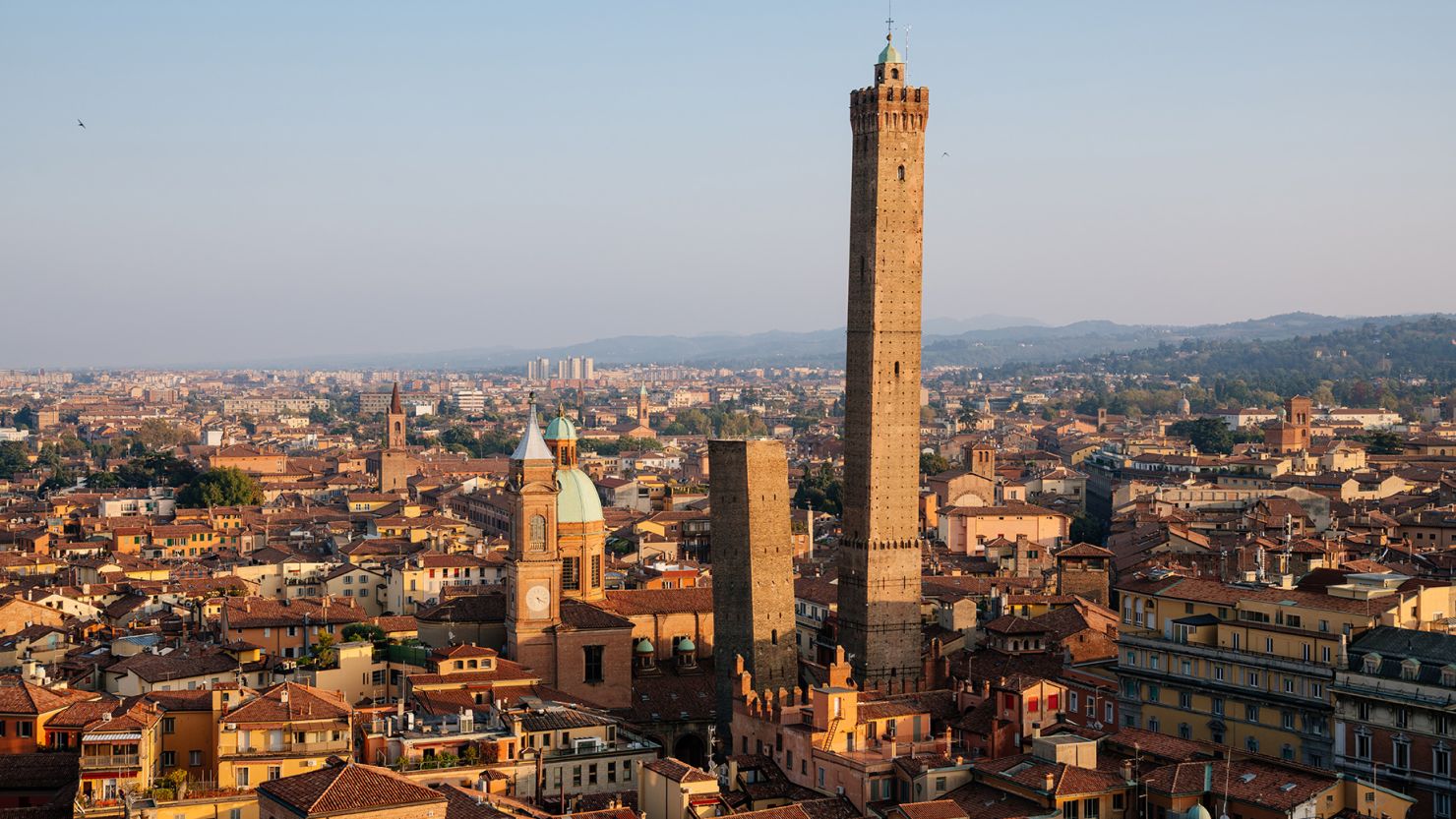 The 'leaning' Garisenda tower and its higher neighbor, the Asinelli sit in the heart of Bologna.