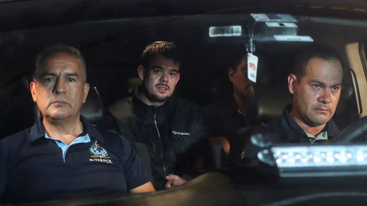 Dutch citizen Joran van der Sloot, who was serving a 28-year sentence in Peru after confessing to killing a 21-year-old Peruvian woman, is escorted to the airport to be extradited to the U.S., to face charges of extortion and wire fraud against the family of Natalee Holloway, in a case linked to his alleged involvement in the disappearance of Natalee Holloway in Aruba in 2005, in Lima, Peru June 8, 2023. REUTERS/Sebastian Castaneda