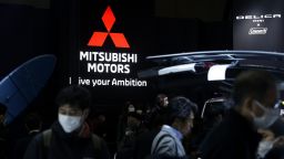 Signage for Mitsubishi Motors Corp. at the Tokyo Auto Salon in Chiba, Japan, on Friday, Jan. 13, 2023. The annual event at Makuhari Messe convention center runs through Jan. 15. Photographer: Kiyoshi Ota/Bloomberg via Getty Images