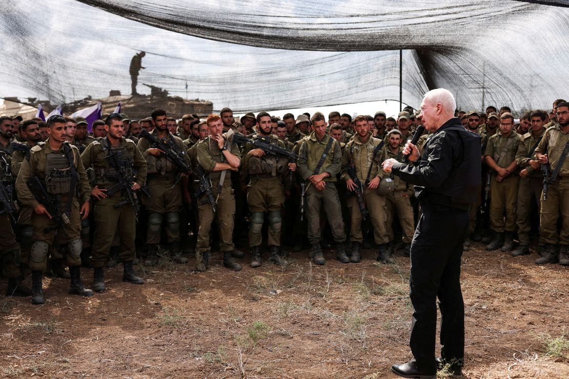 Israel's Defence Minister Yoav Gallant meets soldiers in a field near Israel's border with the Gaza Strip, in southern Israel October 19, 2023. REUTERS/Ronen Zvulun     TPX IMAGES OF THE DAY