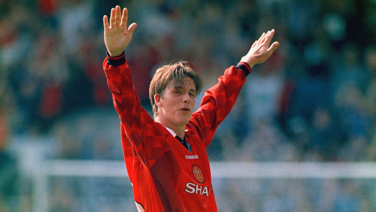 LONDON, UNITED KINGDOM - AUGUST 17:  Manchester United player David Beckham celebrates after scoring the third goal with a spectacular effort from the halfway line, during the Premier League match between Wimbledon and Manchester United at Selhurst Park on August 17, 1996 in London, England. (Photo by Michael Cooper/Allsport/Getty Images)