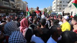 Demonstrators chant slogans near the Israeli embassy in Amman on Friday to show solidarity with Gazans.