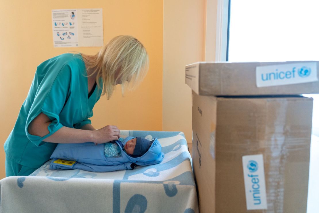 Embrace Global donated its incubators to hospitals in Ukraine through its partner Project HOPE, including to the Sumy Regional Perinatal center in Northeastern Ukraine in 2022. Seen here is a nurse at Sumy Perinatal center secures an infant into an Embrace incubator.
