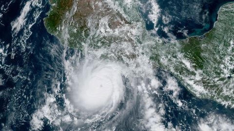 This satellite image provided by NOAA on Tuesday, Oct. 24, 2023, shows Hurricane Otis approaching  Mexico's Pacific coast near Acapulco. Otis is forecast to make landfall early Wednesday and there is a hurricane warning in effect from Punta Maldonado to Zihuatanejo. (NOAA via AP)