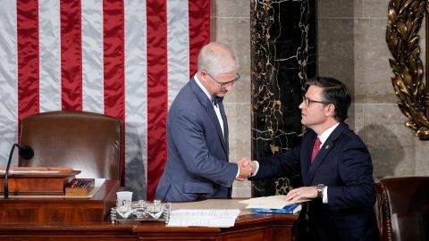 Speaker of the House Pro Tempore Patrick McHenry greets Rep. Mike Johnson, the latest House Republican nominee for House Speaker, prior to another round of voting to pick a new Speaker of the House of Representatives at the US Capitol in Washington, DC, on Wednesday.