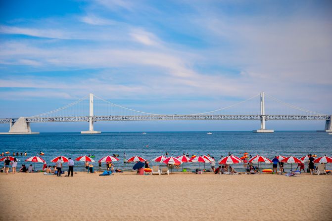 <strong>Gwangalli Beach:</strong> A happening strip of sand filled with cafes, bars and eateries, Gwangalli Beach looks out across the water to Busan's iconic Gwangan Diamond Bridge. 