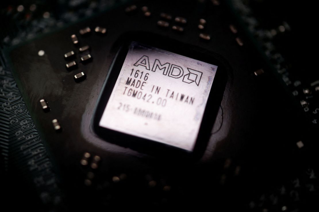 The logo of semiconductor company Advanced Micro Devices Inc (AMD) is seen on a graphics processing unit (GPU) chip in this illustration picture taken February 17, 2023. REUTERS/Florence Lo/Illustration