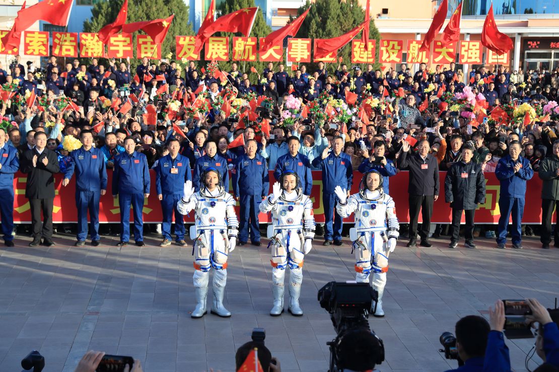 ALXA, CHINA - OCTOBER 26: (L-R) Chinese astronauts Jiang Xinlin, Tang Shengjie and Tang Hongbo, who will carry out the Shenzhou-17 spaceflight mission, attend a see-off ceremony at the Jiuquan Satellite Launch Center on October 26, 2023 in Alxa League, Inner Mongolia Autonomous Region of China. (Photo by VCG/VCG via Getty Images)